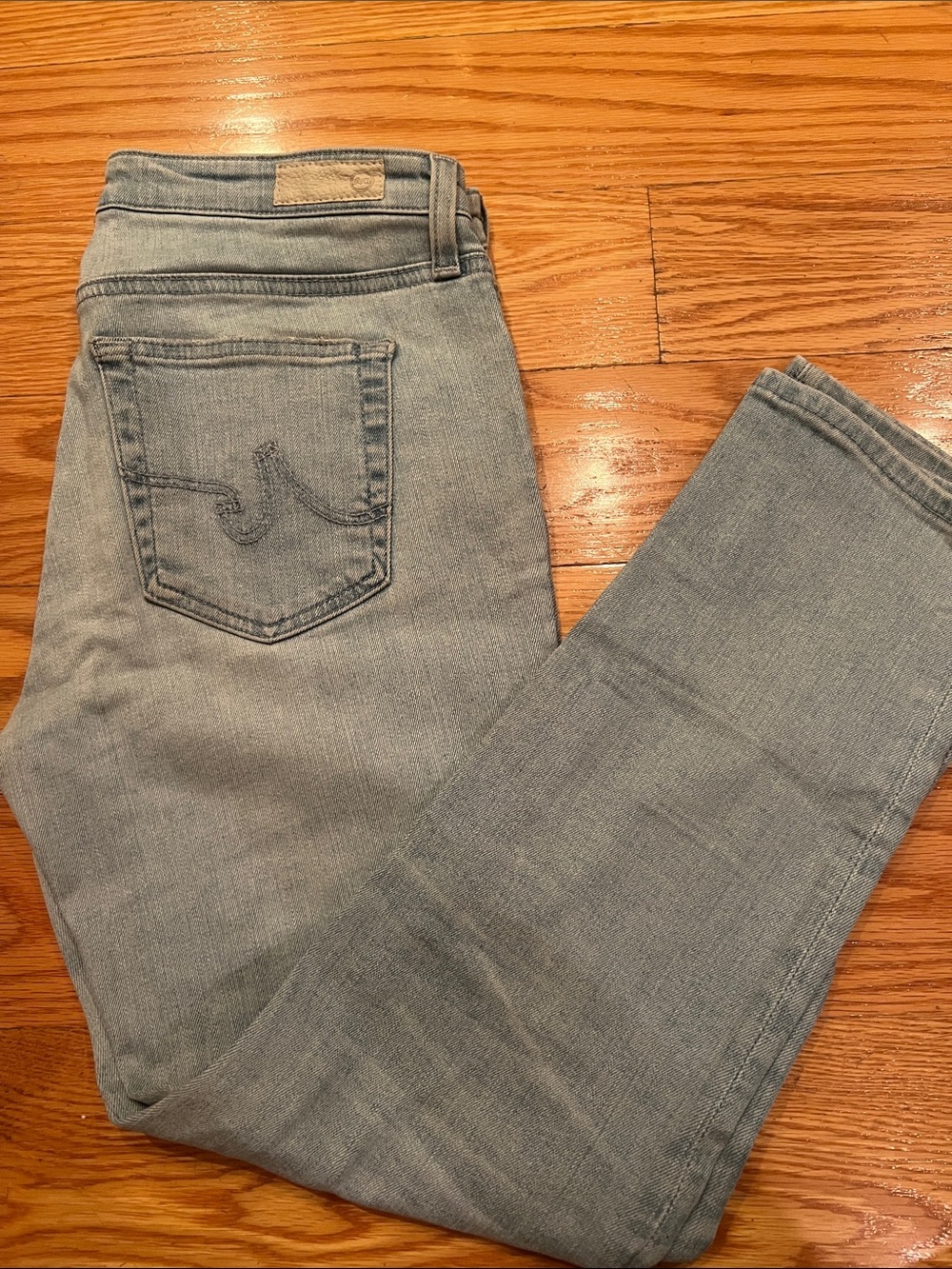 AG Adriano Goldschmied Light Blue Denim Jeans with Red Logo